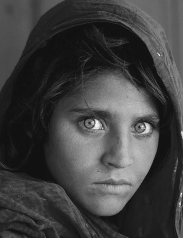 Portrait of Afghan girl with green eyes